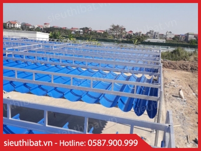 Bạt mái xếp màu xanh cho quán nhậu bờ sông Bình Thạnh